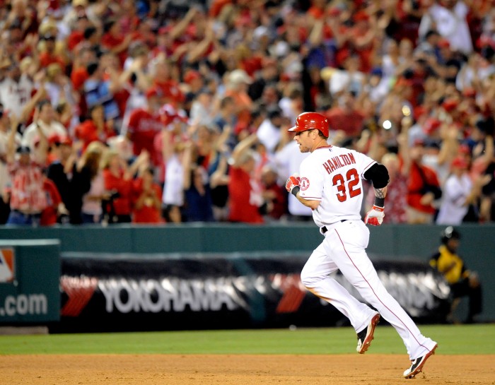 Angels' Josh Hamilton rounds the bases after hitting a 2 run homer bringing in Albert Pujols to tie the game at 5 in the bottom of the 9th inning against Cardinals Thursday at Anaheim Stadium.  – 6/02/13 – MICHAEL LOPEZ, ORANGE COUNTY REGISTER –  