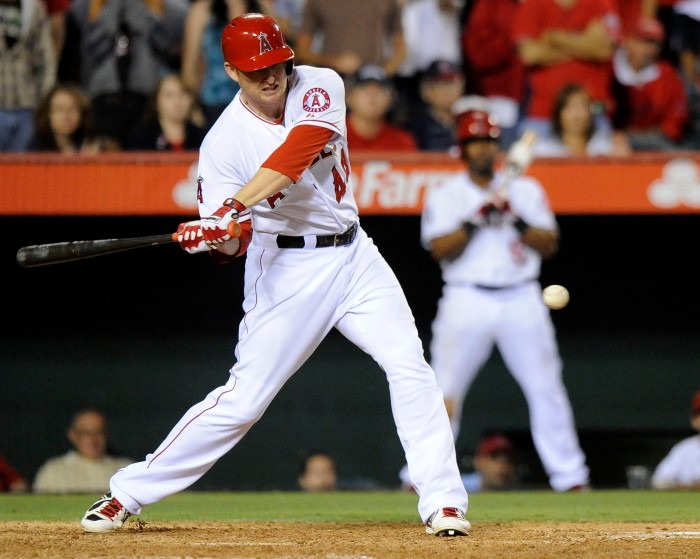 Angels' Mark Trumbo hits a single getting Howard Kendrick into scoring position in the bottom of the 9th inning against Cardinals Thursday at Anaheim Stadium.  – 6/02/13 – MICHAEL LOPEZ, ORANGE COUNTY REGISTER – 