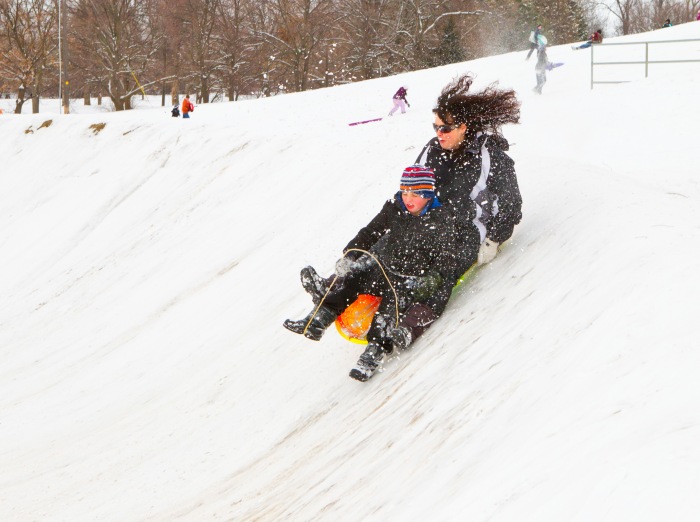 Melissa Cunnington and her son Carson enjoy the this snow as they sled down the slopes at the BMX track on Myra and 12th in College Place. ©Michael Lopez Union Bulletin