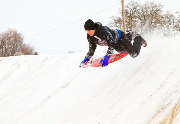 Fernando Ortiz gets some serious air as he rides his sled down the slopes at the BMX track on Myra and 12th in College Place. ©Michael Lopez Union Bulletin