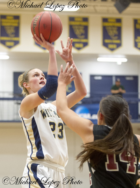 Whitman's Sarah Anderegg nails the short jumper in her game against Chapman's   during the NCAA Division III Women's Tournament at Whitman College. 